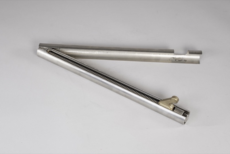 Assembled spring-loaded aluminum rail component