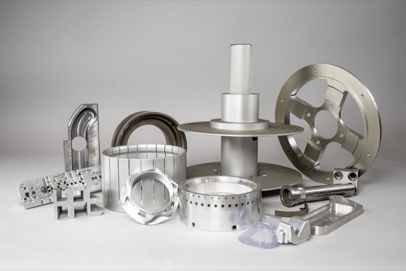A collection of precision-machined aluminum and steel parts made by HPE